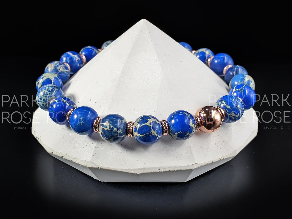 Dark Blue Sea Sediment Jasper Bracelet: 24K Rose Gold Accents (8mm)