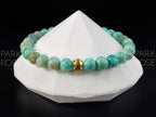 AAAAA Peruvian Turquoise Bracelet: 24K Gold Cat Eye Bead (6mm)