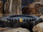 Arfvedsonite Bracelet: 24K Gold Cat Eye Bead
