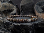 AAAA Madagascar Bronzite Bracelet: Stainless Steel Accent (6/8/10mm)