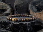AAAA Madagascar Bronzite Bracelet: Stainless Steel Accent (6/8/10mm)