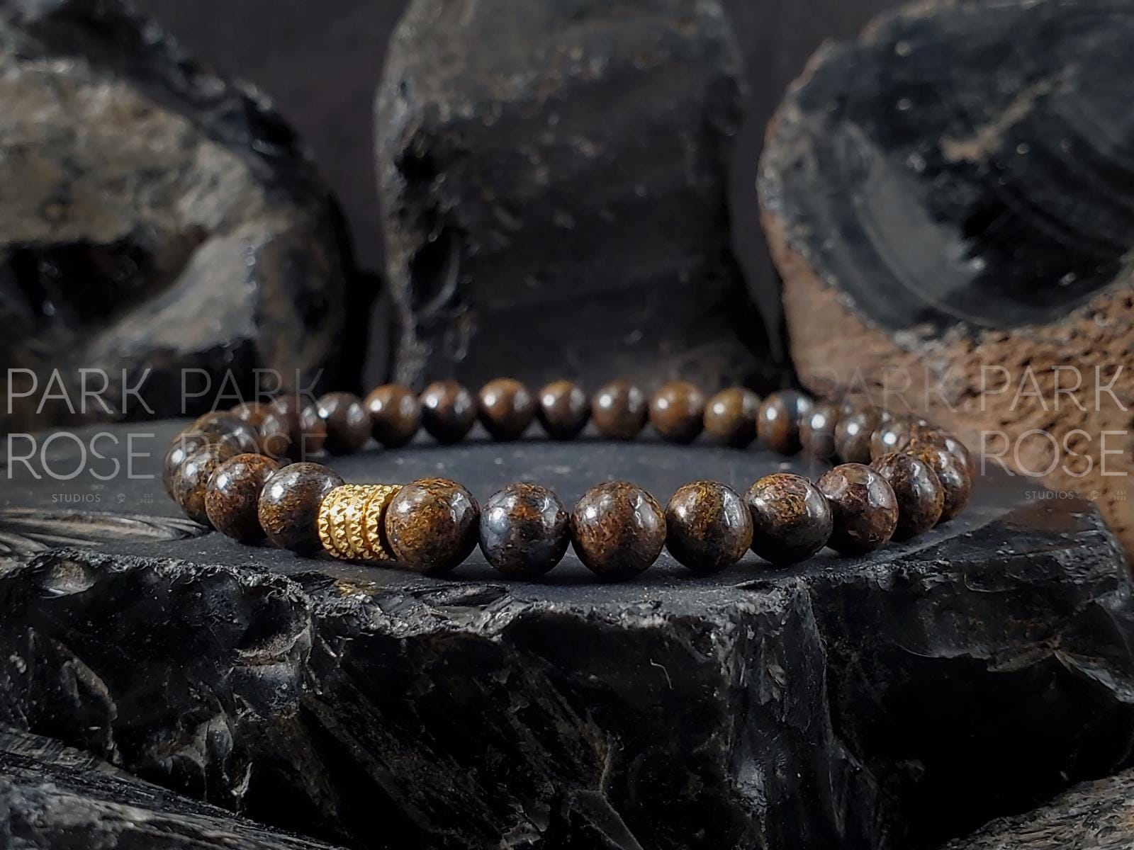 AAAA Madagascar Bronzite Bracelet: Stainless Steel Accent (6/8/10mm)