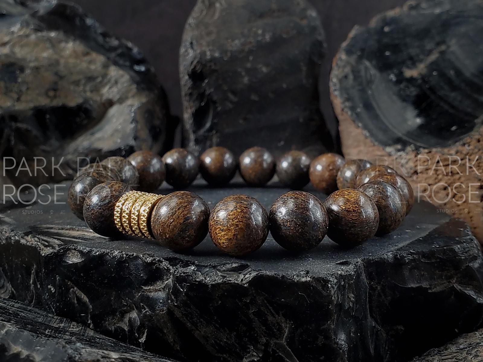 AAAA Madagascar Bronzite Bracelet: Stainless Steel Accent (6/8/10mm)