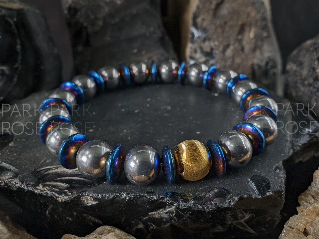 Titanium Blue Hematite Gemstone Bracelet: 24K Gold Cat Eye Bead (10mm)