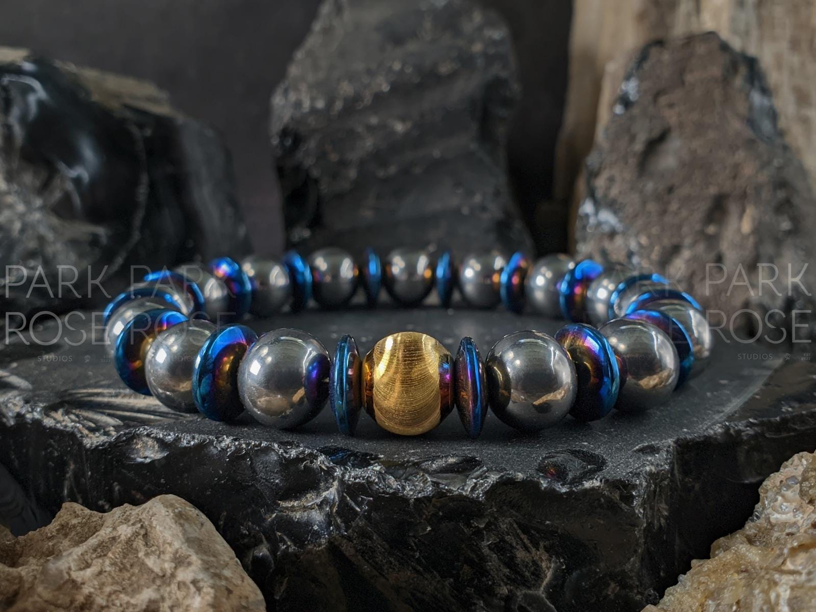 Titanium Blue Hematite Gemstone Bracelet: 24K Gold Cat Eye Bead (10mm)